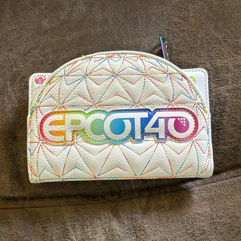 Disney’s Epcot 40 lounge fly parks, wallet, white and colorful 6 1/2 x 4